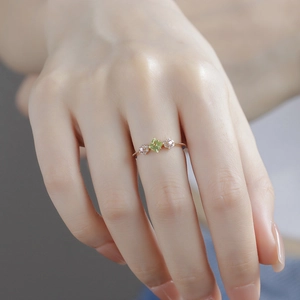 Luxurious gold plated S925 silver ring with square green peridot and floral accents