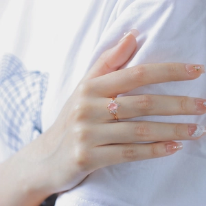 Luxurious S925 silver ring with oval pink crystal and marquise zircons on a rose gold band