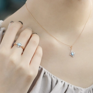 Vintage gold jewelry set with rhombus turquoise floral necklace and matching ring