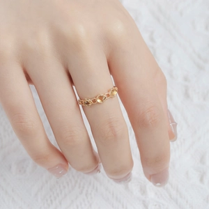 Detail of vintage 14K gold plated silver ring featuring three natural citrine gemstones