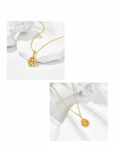 Detailaufnahme einer Vintage-Bernstein-Halskette mit Perlen und Goldbeschichtung