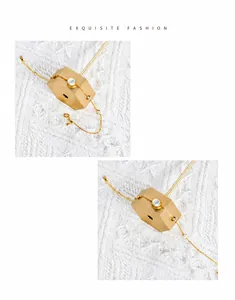 Exquisite gold chain bracelet with white crystal stones and shell details on knit texture