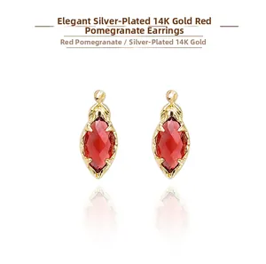 Pendientes de granate talla marquesa en plata bañada en oro 14K con diseño de hojas