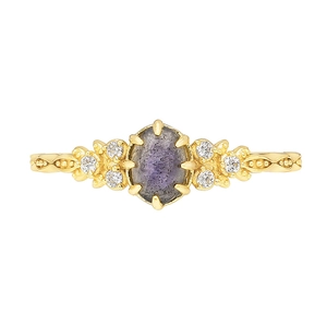 Vintage gold sterling silver ring with oval iolite and labradorite stones on white background