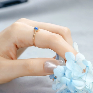 Vintage style S925 silver ring with blue kyanite and golden floral petal setting
