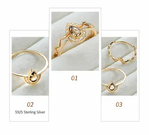 Detalle del conjunto de anillos en plata S925 con cuarzo ahumado pera y circón