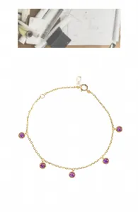 Detail of S999 gold-plated silver bracelet with five round purple gemstones and clasp