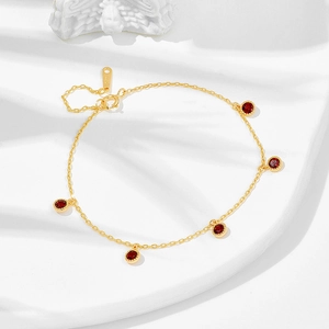 Vintage S925 sterling silver gold-plated bracelet with five round red gemstones