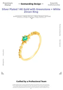 Detailed macro view of 14K gold plated silver ring with emerald-green gemstone and zircons