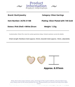 Detail view of pink shell heart earring in 14K gold plated silver with white zircon