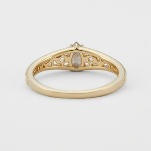 Vintage S925 silver 14k gold plated ring featuring a teardrop moonstone and hollow carving