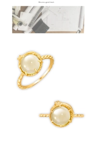 Dettaglio dell'anello gatto in argento S925 placcato oro 14k con cristallo limone e corda