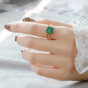 Vintage gold S925 silver ring featuring a rectangular malachite with golden rutiles