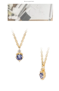 Vues détaillées du pendentif tanzanite en argent S925 avec finition dorée et pierre mauve