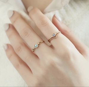 Minimalist S925 silver ring with hexagonal light blue gemstone and gold finish