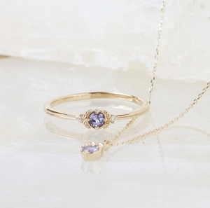 Minimalist S925 silver ring with round purple tanzanite and matching fine gold chain