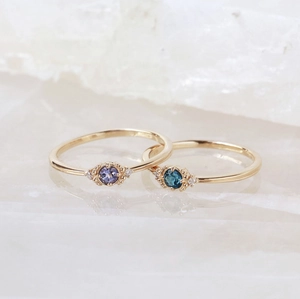 Minimalist S925 silver rings with tanzanite and blue sapphire on white crystal base