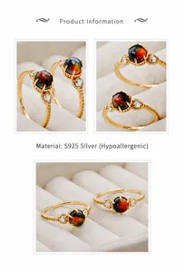 Détail macro d'une bague en argent S925 avec gemme irisée et zircons en goutte
