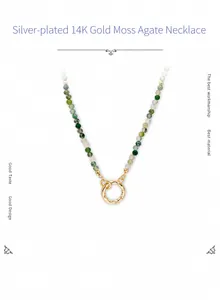 Detail view of natural moss agate beads and 14K gold-plated silver clasp necklace