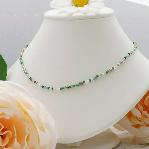 Close-up of vintage S925 silver 14K gold plated moss agate beaded necklace for women