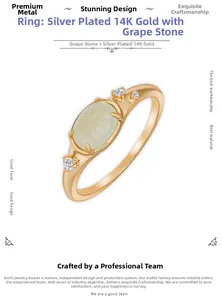 Close-up of 14K gold plated silver ring featuring green prehnite and side diamonds