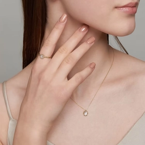 Elegant 14K gold plated silver necklace and ring set with moonstone and white zircon crystals