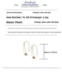 Detail view of 925 silver 14K gold plated water drop pearl earrings measuring 41.35mm