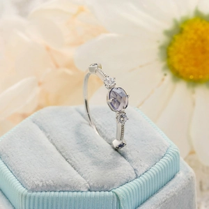 S925 silver ring with blue sapphire, white zircon, and milgrain details on velvet