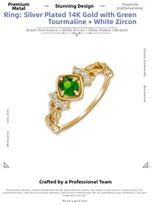 Macro shot of 14K gold plated silver ring with green diopside and white zircon stones