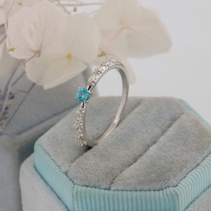 Detailed macro view of S925 silver ring featuring blue stone and snowflake relief carving