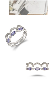 Makro-Detail des Silberring-Sets mit lila Steinen im Marquise-Schliff und Kronenband
