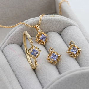 Luxurious S925 sterling silver jewelry set with purple gemstones and hollow gold design