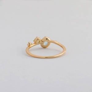 Elegant S925 silver 14K gold ring with blue topaz and yellow gems in nature-inspired style