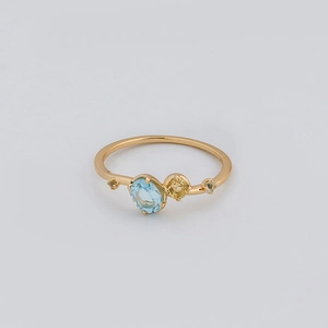 Irregular S925 silver 14K gold ring featuring sky blue topaz and yellow gems