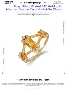 Macro view of a 14k gold plated silver ring with citrine and white zircon stones