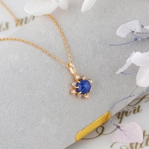 Pendente fiocco di neve in argento S925 oro 14K con zaffiro stellato e perle