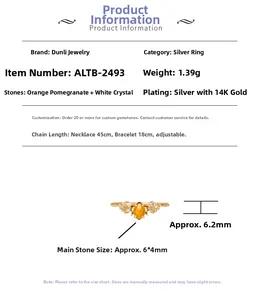 Detalle del anillo de plata 925 bañado en oro 14K con granate naranja y cristales blancos