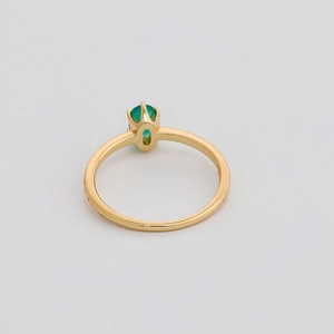 Elegant 925 silver ring with oval green chalcedony stone in a gold minimalist setting