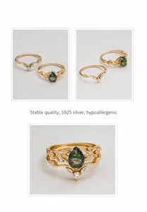 Detail van S925 zilveren 14k vergulde ringenset met mosagaat en V-vormige ringband