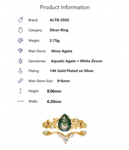 Macro detail van S925 zilveren 14k gouden ringset met mosagaat en witte zirkonia steentjes