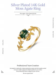 Detailed shot of S925 silver leaf ring featuring green agate and 14k gold plating