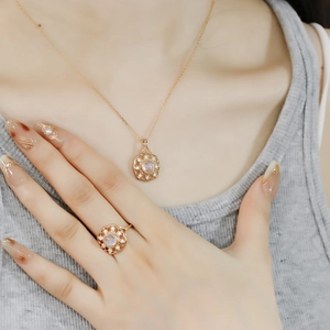 Model wearing 14k gold plated S925 silver moonstone necklace and open ring set