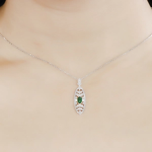 Close-up of vintage French green chalcedony pendant with cubic zirconia on S925 silver chain