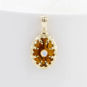Pendentif ovale vintage en argent doré avec pierre œil de tigre et cristal opale