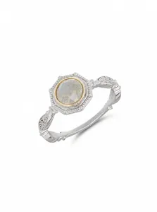 Detail of vintage 925 silver ring with 14K gold plating and round labradorite stone
