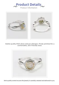 Detail of S925 sterling silver ring with vintage engravings and labradorite gemstone