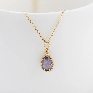 Collana in argento S925 placcato oro 14K con ciondolo ametista e dettagli floreali traforati