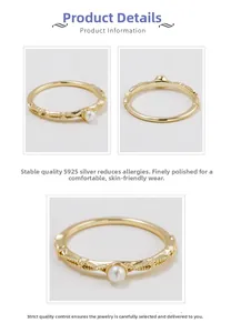 Detail of S925 silver ring with pearl, vintage engraved gold finish and milgrain texture