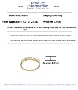 Detalle de anillo con piedras preciosas irregulares, prehnita, labradorita y ópalo
