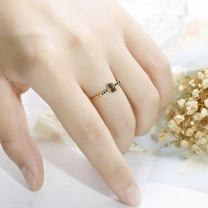 Detail of s925 silver gold-plated ring with octagonal smoky quartz and black diamonds